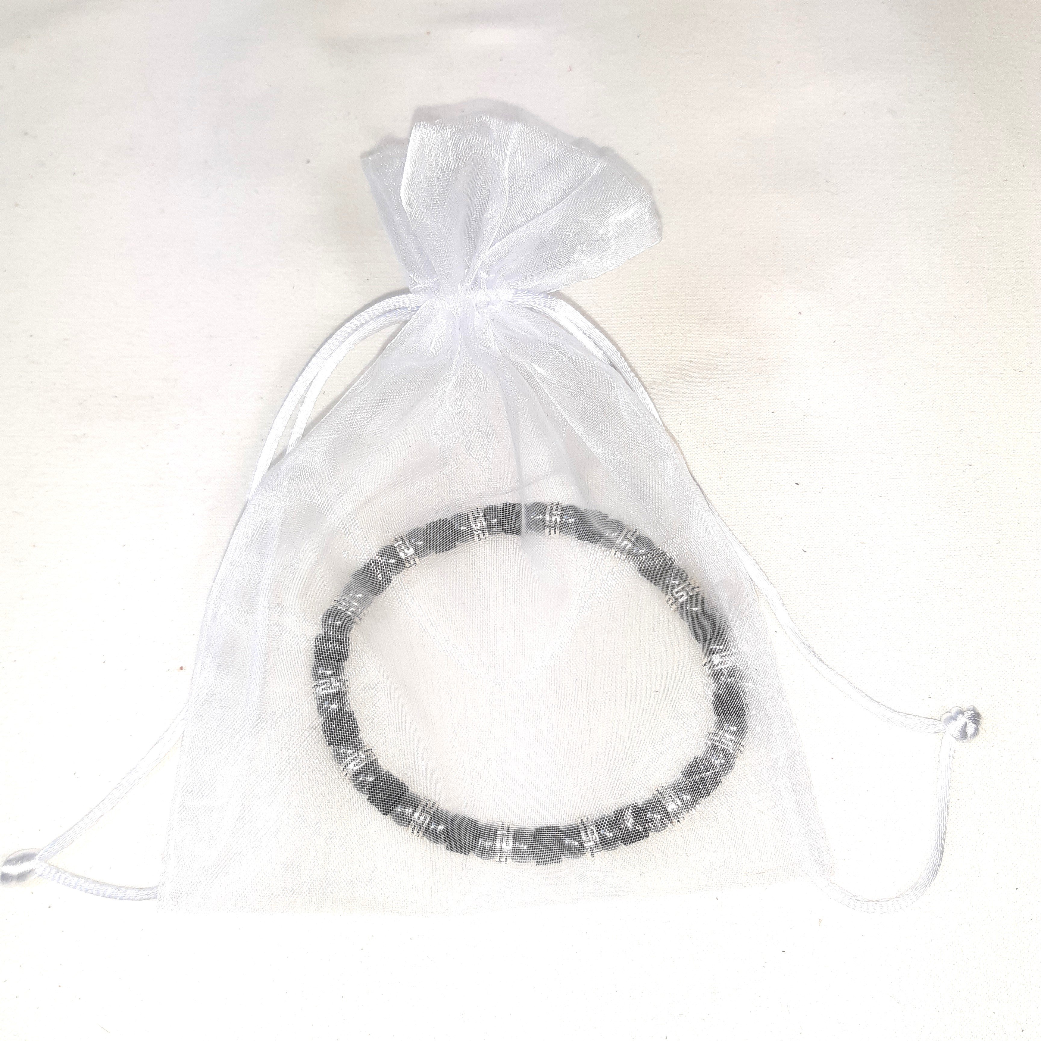 Bracelet extensible cuir et h&eacute;matite