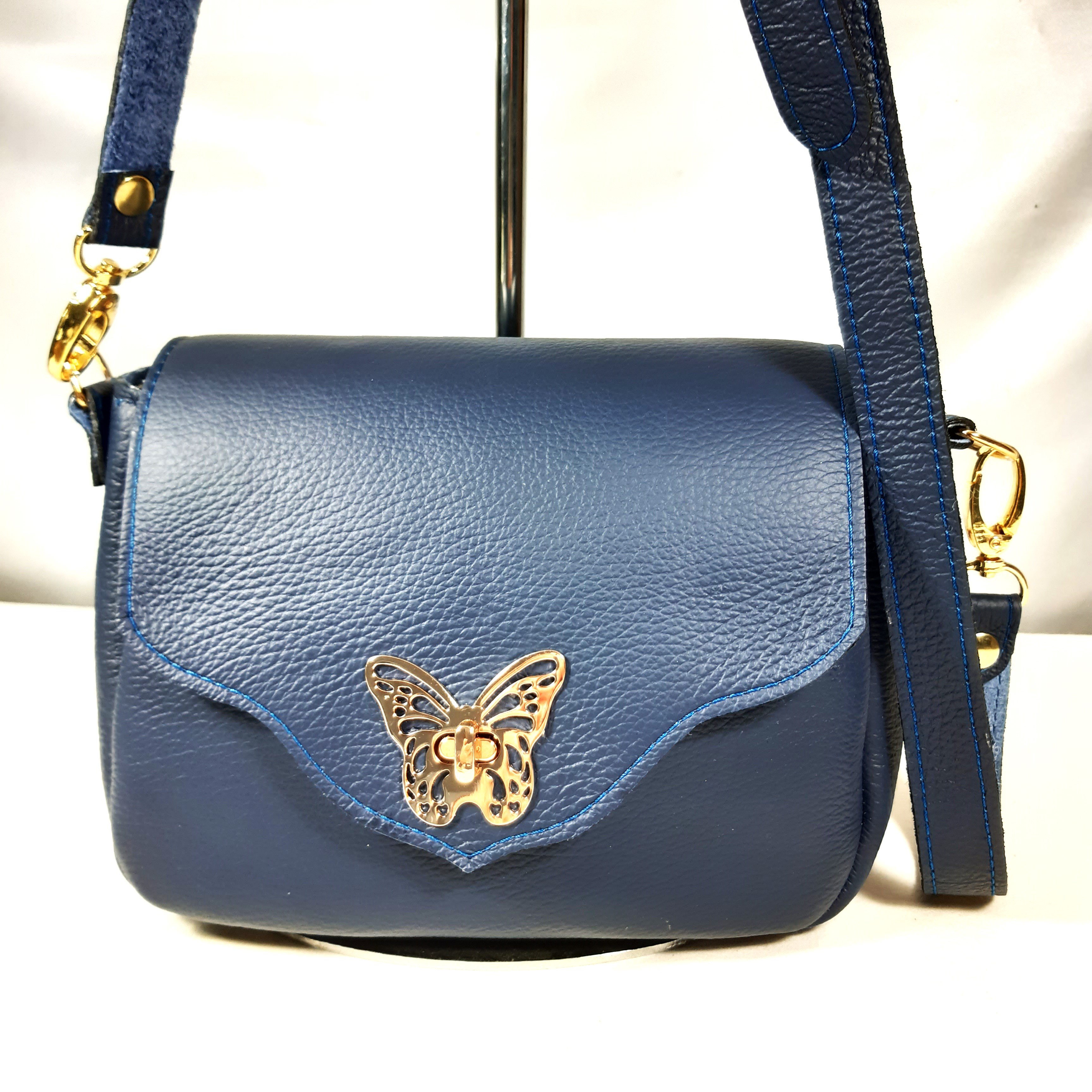Sac cuir, fermoir papillon .